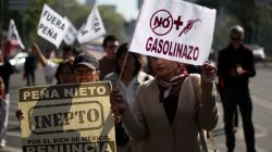 Demonstrators march after gas prices are raised in Mexico