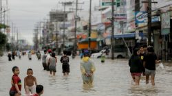 People in flood street in Thailand