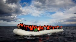 raft overcrowded with migrants/refugees in the Mediterranean Sea