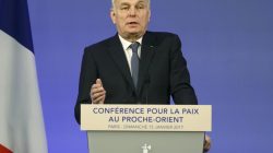 France leader saying he will continue Iran Nuclear Deal
