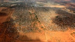 makeshift shelters in Kenyan refugee camp
