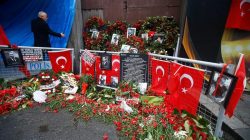 Flowers and pictures of the victims are placed near the entrance of Reina nightclub in Istanbul, Turkey,
