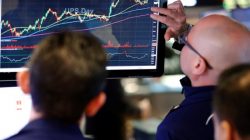 Traders work on the floor of the New York Stock Exchange (NYSE) shortly after the opening bell in New York, U.S.,