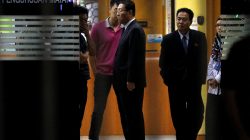 North Korean ambassador to Malaysia Kang Chol (C) leaves a morgue at Kuala Lumpur General Hospital where Kim Jong Nam's body is held for autopsy in Kuala Lumpur, Malaysia