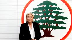 Marine Le Pen, French National Front (FN) political party leader and candidate for the French 2017 presidential elections, stands in front of the logo of the Christian Lebanese Forces party during her meeting with Samir Geagea, leader of the party, in Maarab, north of Beirut, Lebanon February 21, 2017. REUTERS/Mohamed Azakir