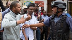 Somali nationals argue with police during clashes in Pretoria, South Africa, February 24, 2017. REUTERS/ James Oatway