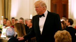 U.S. President Donald Trump walks after speaking during the Governor's Dinner in the State Dining Room at the White House in Washington, U.S., February 26, 2017.
