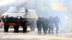 REFILE EDITING BYLINE IN IPTCPolice approach a local government office following an explosion in Bandung, West Java, Indonesia February 27, 2017, in this photo taken by Pikiran Rakyat newspaper. Pikiran Rakyat Newspaper/Harry Surjana/via REUTERS.
