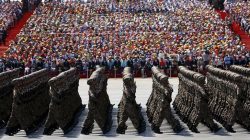 Soldiers of China's People's Liberation Army (PLA) march during the military parade to mark the 70th anniversary of the end of World War Two, in Beijing, China, September 3, 2015. REUTERS/Damir Sagolj/File Photo