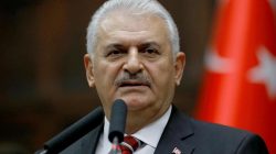 Turkey's Prime Minister Binali Yildirim addresses members of parliament from his ruling AK Party (AKP) during a meeting at the Turkish parliament in Ankara, Turkey