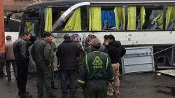 Syrian army soldiers and civilians inspect the damage at the site of an attack by two suicide bombers in Damascus, Syria March 11, 2017. REUTERS/Omar Sanadiki