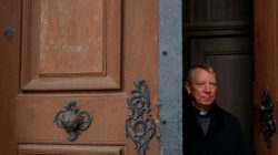 Miklos Beer, the bishop of Vac, stands at the gates of the cathedral in Vac, Hungary March 9, 2017. REUTERS/Laszlo Balogh