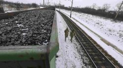 FILE PHOTO: Activists walk along carriages loaded with coal from the occupied territories which they blocked at Kryvyi Torets station in the village of Shcherbivka in Donetsk region, Ukraine, February 14, 2017. REUTERS/Konstantin Chernichkin/File Photo
