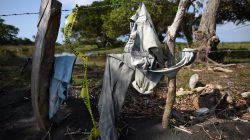Clothing is pictured on a wire fence at site of unmarked graves where a forensic team and judicial authorities are working in after human skulls were found, in Alvarado, in Veracruz state, Mexico,