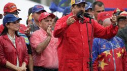 Venezuela's President Nicolas Maduro speaks during a pro-government rally, next to his wife Cilia Flores (L), in Caracas, Venezuela March 9, 2017. REUTERS/Marco Bello