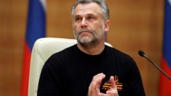 Sevastopol Mayor Alexei Chaliy applauds during a meeting of deputies of the State Duma, Russia's lower parliament house, with members of the Crimean parliamentary delegation in Moscow