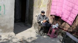 Abdelraziq Abdelkarim sits on a wheelchair as he enjoys the afternoon next to frontline positions of Iraqi Federal Police fighting the Islamic State in Mosul,