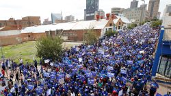Demonstrators carry banners as they take part in a protest calling for the removal of South Africa's President Jacob Zuma in Johannesburg. REUTERS/Mike Hutchings