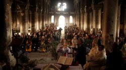 Iraqis attend the first Palm Sunday procession in the burnt out main church of the Christian city of Qaraqosh since Iraqi forces retook it from Islamic States militants,