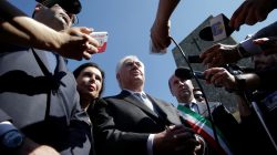 U.S. Secretary of State Rex Tillerson, (C) talks to reporters during a ceremony at the Sant'Anna di Stazzema memorial, dedicated to the victims of the massacre committed in the village of Sant'Anna di Stazzema by the Nazis in 1944 during World War II, Italy