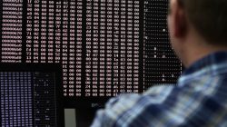 An analyst looks at code in the malware lab of a cyber security defense lab at the Idaho National Laboratory in Idaho Falls, Idaho