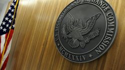 The seal of the U.S. Securities and Exchange Commission hangs on the wall at SEC headquarters in Washington, DC