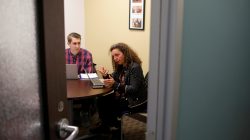Program coordinator David Phillippi (L) and Executive Director Myrian Nadri with "Parents For Peace", a support group founded by parents whose children were involved in extremist violence and which is starting a telephone helpline for people who fear their loved ones are being recruited into extremist organizations, speak to Reuters in Brookline, Massachusetts, U.S., March 23, 2017. Picture taken March 23, 2017. REUTERS/Brian Snyder