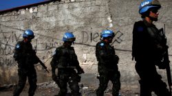 U.N. peacekeepers walk along a street during a patrol with Haitian national police officers and members of UNPOL (United Nations Police) in the neighborhood of Cite Soleil, in Port-au-Prince, Haiti, March 3, 2017. Picture taken March 3, 2017. REUTERS/Andres Martinez Casares
