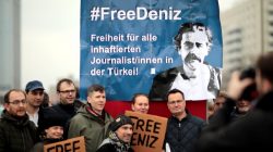 FILE PHOTO: Protestors demonstrate, calling for the freedom of German-Turkish journalist Deniz Yucel, in the streets of Berlin, Germany, February 19, 2017. REUTERS/Axel Schmidt