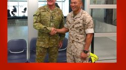 U.S. Marines commander Lieutenant Colonel Brian Middleton (R) shakes hands with Australian Army Brigadier Ken James after arriving for the sixth annual Marines' deployment at Darwin in northern Australia, April 18, 2017. REUTERS/Tom Westbrook