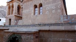 FILE PHOTO - Men walk inside Saint Catherine's monastery, in the Sinai Peninsula, south of Egypt, December 8, 2015. REUTERS/Amr Abdallah Dalsh/File Photo