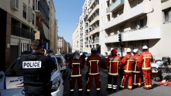 French firefighters secure the street as police conduct an investigation after two Frenchmen were arrested in Marseille, France, April 18, 2017 for planning to carry out an "imminent and violent attack" ahead of the first round of the presidential election on Sunday, France's interior minister said.   REUTERS/Philippe Laurenson 