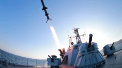 A missile is fired from a naval vessel during the test-firing of a new type of anti-ship cruise missile to be equipped at Korean People's Army naval units. REUTERS/KCNA