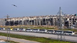 A convoy of buses carrying evacuees from the two Shi'ite villages of al-Foua and Kefraya arrive to government-controlled Aleppo, in this handout picture provided by SANA on April 12, 2017. SANA/Handout via REUTERS