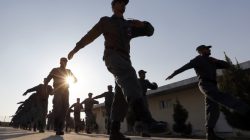 Afghan National Police (ANP) officers march at a training centre near the German Bundeswehr army camp in Kunduz, northern Afghanistan