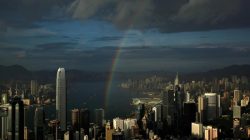 FILE PHOTO: A rainbow arches over Hong Kong's Victoria Harbour June 19, 2012. REUTERS/Bobby Yip/File Photo