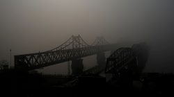 FILE PHOTO: The Friendship and the Broken bridges over the Yalu River connecting the North Korean town of Sinuiju and Dandong in China's Liaoning province, April 16, 2017. REUTERS/Aly Song/File Photo