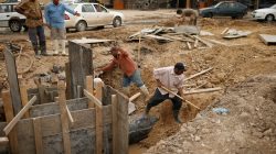 Iraqis workers repair sewage line in eastern Mosul, Iraq May 2, 2017. REUTERS/Suhaib Salem