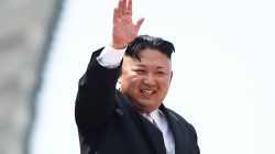 North Korean leader Kim Jong Un waves to people attending a military parade marking the 105th birth anniversary of country's founding father, Kim Il Sung in Pyongyang. REUTERS/Damir Sagolj