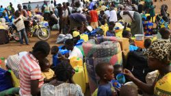 South Sudanese refugee families displaced by fighting gather at Imvepi settlement in Arua district, northern Uganda, April 4, 2017. REUTERS/James Akena