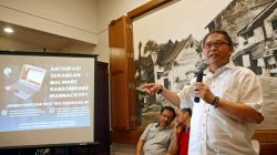 Indonesia's Minister of Communications and Information, Rudiantara, speaks to journalists during a press conference about the recent cyber attack, at a cafe in Jakarta, Indonesia