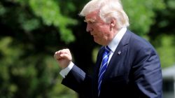 U.S. President Donald Trump gestures as he walks on the South Lawn of the White House upon his return to Washington, U.S., May 17, 2017. REUTERS/Yuri Gripas