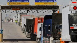 FILE PHOTO - Trucks wait in a long queue for border customs control to cross into the U.S. at the Otay border crossing in Tijuana, Mexico, February 2, 2017. REUTERS/Jorge Duenes/File photo