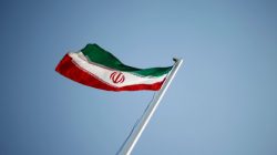 FILE PHOTO: An Iranian national flag flutters in Tehran April 15, 2011. REUTERS/STR/File Photo