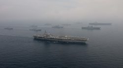 The U.S. Navy aircraft carriers USS Ronald Reagan (front) and USS Carl Vinson and (back R) sail with their strike groups and Japanese naval ships during training in the Sea of Japan, June 1, 2017.