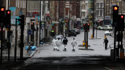 Forensic officers walk along the road at the scene of the attack on London Bridge and Borough Market, London, Britain. REUTERS/Marko Djurica