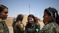 Syrian Democratic Forces (SDF) female fighters gather at the eastern outskirts of Raqqa city, Syria June 7, 2017. Picture taken June 7, 2017. REUTERS/Rodi Said