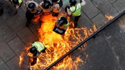 Riot security forces members catch fire during riots at a rally against Venezuelan President Nicolas Maduro's government in Caracas, Venezuela, June 7, 2017. REUTERS/Carlos Garcia Rawlins