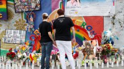 Guests visit the memorial outside the Pulse Nightclub on the one year anniversary of the shooting, in Orlando, Florida.