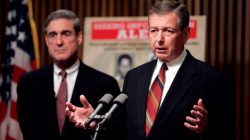 FILE PHOTO -- U.S. Attorney General John Ashcroft (R) and FBI Director Robert Mueller speak about possible terrorist threats against the United States, in Washington, May 26, 2004